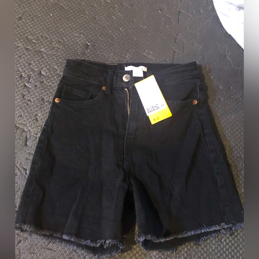 Never been worn black denim cut off shorts